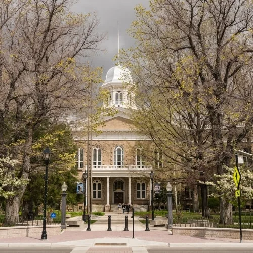 a building in nevada surrounded by trees